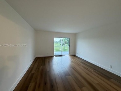 Newly renovated unit is a must see featuring a beautiful view of on Atlantis Golf Club in Florida - for sale on GolfHomes.com, golf home, golf lot