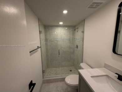 Newly renovated unit is a must see featuring a beautiful view of on Atlantis Golf Club in Florida - for sale on GolfHomes.com, golf home, golf lot