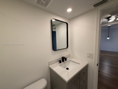 Newly renovated unit is a must see featuring a beautiful view of on Atlantis Golf Club in Florida - for sale on GolfHomes.com, golf home, golf lot