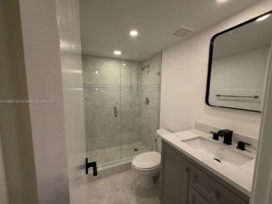 Newly renovated unit is a must see featuring a beautiful view of on Atlantis Golf Club in Florida - for sale on GolfHomes.com, golf home, golf lot