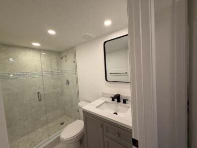 Newly renovated unit is a must see featuring a beautiful view of on Atlantis Golf Club in Florida - for sale on GolfHomes.com, golf home, golf lot