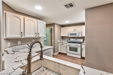 IMMACULATE & FULLY UPGRADED 1ST floor unit inside GUARD GATED on WildHorse Golf Club in Nevada - for sale on GolfHomes.com, golf home, golf lot