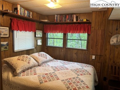Escape to your own seasonal retreat in a vibrant, amenity-rich on Land Harbor Golf Course in North Carolina - for sale on GolfHomes.com, golf home, golf lot