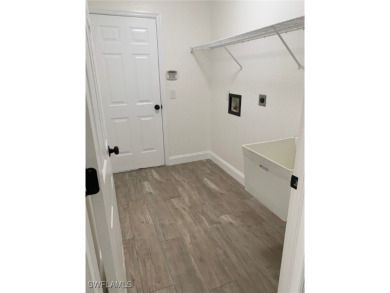 Come see this beautiful 4 Bedroom/3 Bathroom home with a on Royal Tee Country Club in Florida - for sale on GolfHomes.com, golf home, golf lot