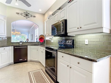SWEEPING WATER VIEWS IN PLANTATION GOLF & COUNTRY CLUB! on Plantation Golf and Country Club in Florida - for sale on GolfHomes.com, golf home, golf lot