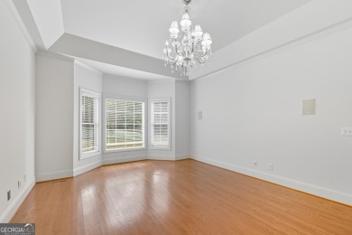 Step inside to find gleaming hardwood floors throughout the main on Chapel Hills Golf and Country Club in Georgia - for sale on GolfHomes.com, golf home, golf lot