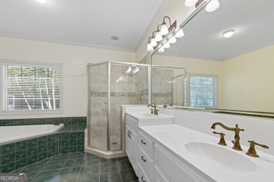 Step inside to find gleaming hardwood floors throughout the main on Chapel Hills Golf and Country Club in Georgia - for sale on GolfHomes.com, golf home, golf lot