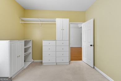 Step inside to find gleaming hardwood floors throughout the main on Chapel Hills Golf and Country Club in Georgia - for sale on GolfHomes.com, golf home, golf lot