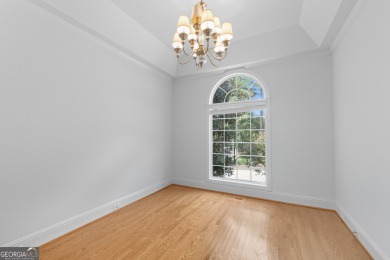 Step inside to find gleaming hardwood floors throughout the main on Chapel Hills Golf and Country Club in Georgia - for sale on GolfHomes.com, golf home, golf lot