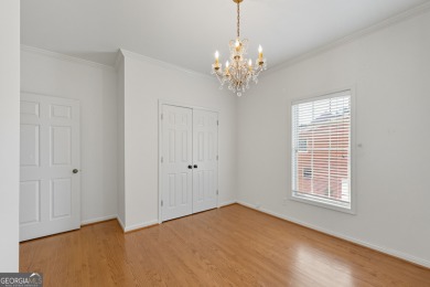 Step inside to find gleaming hardwood floors throughout the main on Chapel Hills Golf and Country Club in Georgia - for sale on GolfHomes.com, golf home, golf lot