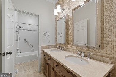 Step inside to find gleaming hardwood floors throughout the main on Chapel Hills Golf and Country Club in Georgia - for sale on GolfHomes.com, golf home, golf lot