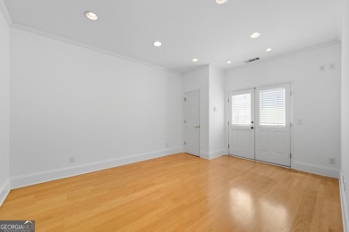 Step inside to find gleaming hardwood floors throughout the main on Chapel Hills Golf and Country Club in Georgia - for sale on GolfHomes.com, golf home, golf lot