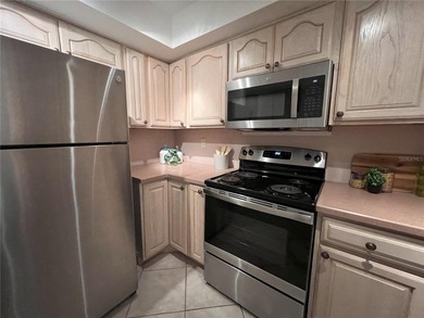 Discover Resort-Style Living in Isla del Sol - Stunning on Isla Del Sol Yacht and Country Club in Florida - for sale on GolfHomes.com, golf home, golf lot