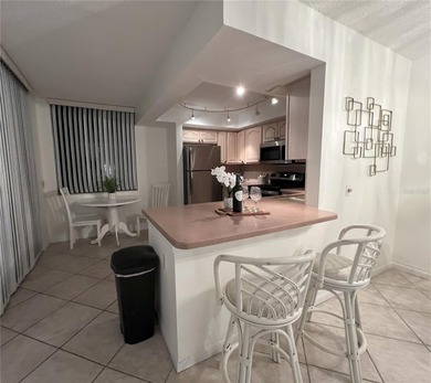 Discover Resort-Style Living in Isla del Sol - Stunning on Isla Del Sol Yacht and Country Club in Florida - for sale on GolfHomes.com, golf home, golf lot