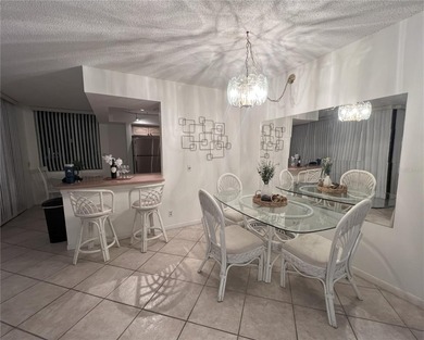 Discover Resort-Style Living in Isla del Sol - Stunning on Isla Del Sol Yacht and Country Club in Florida - for sale on GolfHomes.com, golf home, golf lot