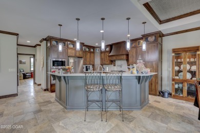 Luxury meets lifestyle in this custom-built masterpiece nestled on Briarbrook Golf Course in Missouri - for sale on GolfHomes.com, golf home, golf lot