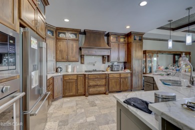 Luxury meets lifestyle in this custom-built masterpiece nestled on Briarbrook Golf Course in Missouri - for sale on GolfHomes.com, golf home, golf lot