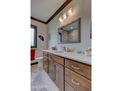 Luxury meets lifestyle in this custom-built masterpiece nestled on Briarbrook Golf Course in Missouri - for sale on GolfHomes.com, golf home, golf lot