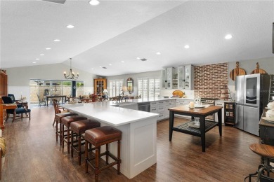 This BETTER-THAN-NEW, UPSCALE home is one of the LARGEST and on Evans Prairie Golf and Country Club in Florida - for sale on GolfHomes.com, golf home, golf lot