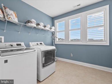 Blending timeless coastal style, superior craftsmanship, and on The Peninsula Golf and Country Club in Delaware - for sale on GolfHomes.com, golf home, golf lot