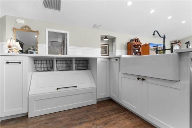 This BETTER-THAN-NEW, UPSCALE home is one of the LARGEST and on Evans Prairie Golf and Country Club in Florida - for sale on GolfHomes.com, golf home, golf lot