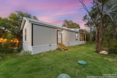 This charming 2-bedroom home in Spring Branch offers peaceful on Rebecca Creek Golf Club in Texas - for sale on GolfHomes.com, golf home, golf lot
