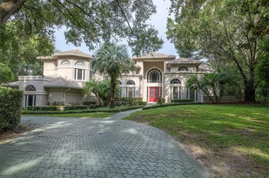 Under contract-accepting backup offers. Nestled along the front on Isleworth Golf and Country Club in Florida - for sale on GolfHomes.com, golf home, golf lot