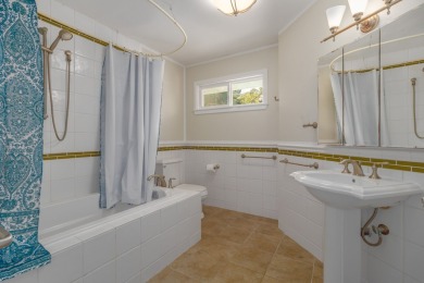 Very comfortable 3 bedroom 2 bath residence sits elevated above on Volcano Golf and Country Club in Hawaii - for sale on GolfHomes.com, golf home, golf lot