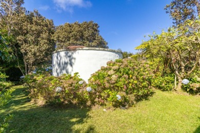Very comfortable 3 bedroom 2 bath residence sits elevated above on Volcano Golf and Country Club in Hawaii - for sale on GolfHomes.com, golf home, golf lot