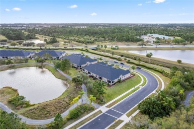 Embrace luxurious lakeside living in this captivating 2-bed + on Majors Golf Club At Bayside Lakes in Florida - for sale on GolfHomes.com, golf home, golf lot