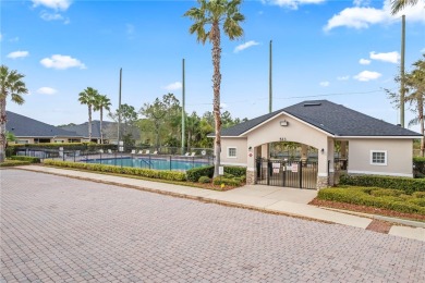 Embrace luxurious lakeside living in this captivating 2-bed + on Majors Golf Club At Bayside Lakes in Florida - for sale on GolfHomes.com, golf home, golf lot