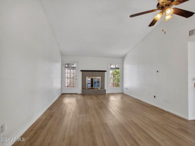 Step into this welcoming single-level townhome nestled in the on Bellaire Golf Club in Arizona - for sale on GolfHomes.com, golf home, golf lot