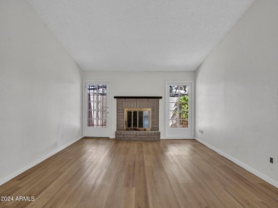 Step into this welcoming single-level townhome nestled in the on Bellaire Golf Club in Arizona - for sale on GolfHomes.com, golf home, golf lot