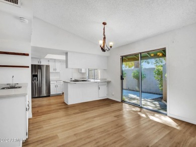 Step into this welcoming single-level townhome nestled in the on Bellaire Golf Club in Arizona - for sale on GolfHomes.com, golf home, golf lot