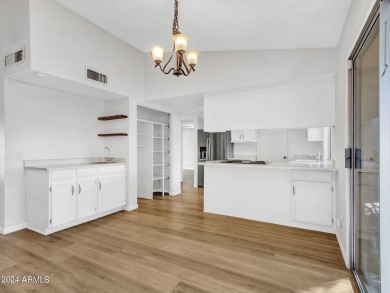 Step into this welcoming single-level townhome nestled in the on Bellaire Golf Club in Arizona - for sale on GolfHomes.com, golf home, golf lot