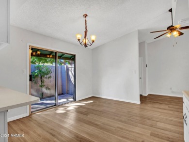 Step into this welcoming single-level townhome nestled in the on Bellaire Golf Club in Arizona - for sale on GolfHomes.com, golf home, golf lot