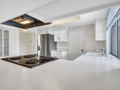 Step into this welcoming single-level townhome nestled in the on Bellaire Golf Club in Arizona - for sale on GolfHomes.com, golf home, golf lot