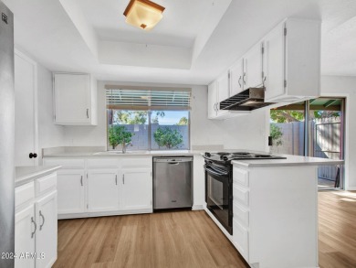 Step into this welcoming single-level townhome nestled in the on Bellaire Golf Club in Arizona - for sale on GolfHomes.com, golf home, golf lot