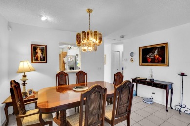 Step into effortless coastal elegance in this beautifully on Marina Lakes Golf Course in Florida - for sale on GolfHomes.com, golf home, golf lot