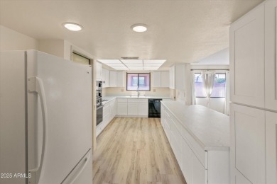 Step inside and be greeted by a beautifully remodeled kitchen on Stardust Golf Course in Arizona - for sale on GolfHomes.com, golf home, golf lot