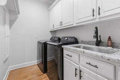 Spacious family home! Step into beautifully designed family on Cypress Lakes Golf and Country Club in Alabama - for sale on GolfHomes.com, golf home, golf lot