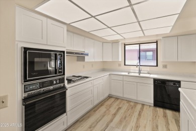 Step inside and be greeted by a beautifully remodeled kitchen on Stardust Golf Course in Arizona - for sale on GolfHomes.com, golf home, golf lot