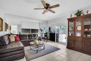 Step into effortless coastal elegance in this beautifully on Marina Lakes Golf Course in Florida - for sale on GolfHomes.com, golf home, golf lot