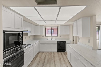 Step inside and be greeted by a beautifully remodeled kitchen on Stardust Golf Course in Arizona - for sale on GolfHomes.com, golf home, golf lot