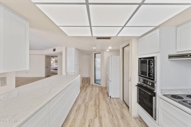 Step inside and be greeted by a beautifully remodeled kitchen on Stardust Golf Course in Arizona - for sale on GolfHomes.com, golf home, golf lot