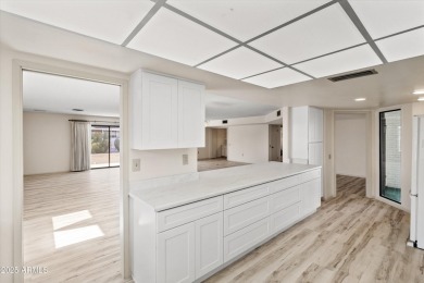Step inside and be greeted by a beautifully remodeled kitchen on Stardust Golf Course in Arizona - for sale on GolfHomes.com, golf home, golf lot