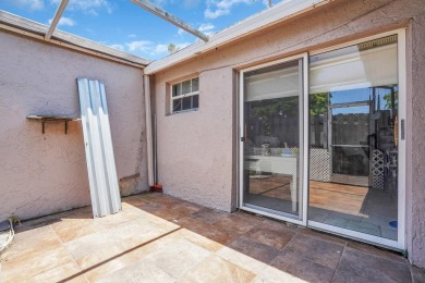 Step into effortless coastal elegance in this beautifully on Marina Lakes Golf Course in Florida - for sale on GolfHomes.com, golf home, golf lot