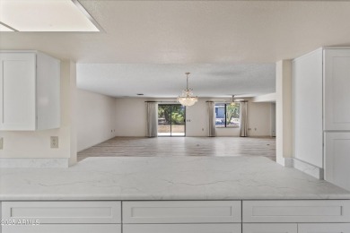 Step inside and be greeted by a beautifully remodeled kitchen on Stardust Golf Course in Arizona - for sale on GolfHomes.com, golf home, golf lot