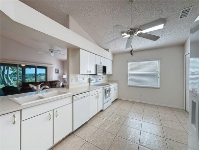 Great views of the city & golf course. Popular Canterbury model on Kings Ridge Golf Club in Florida - for sale on GolfHomes.com, golf home, golf lot