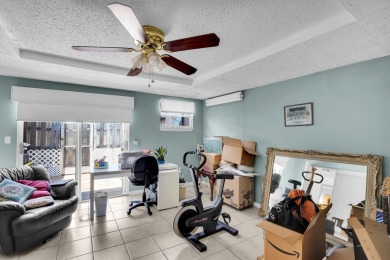 Step into effortless coastal elegance in this beautifully on Marina Lakes Golf Course in Florida - for sale on GolfHomes.com, golf home, golf lot